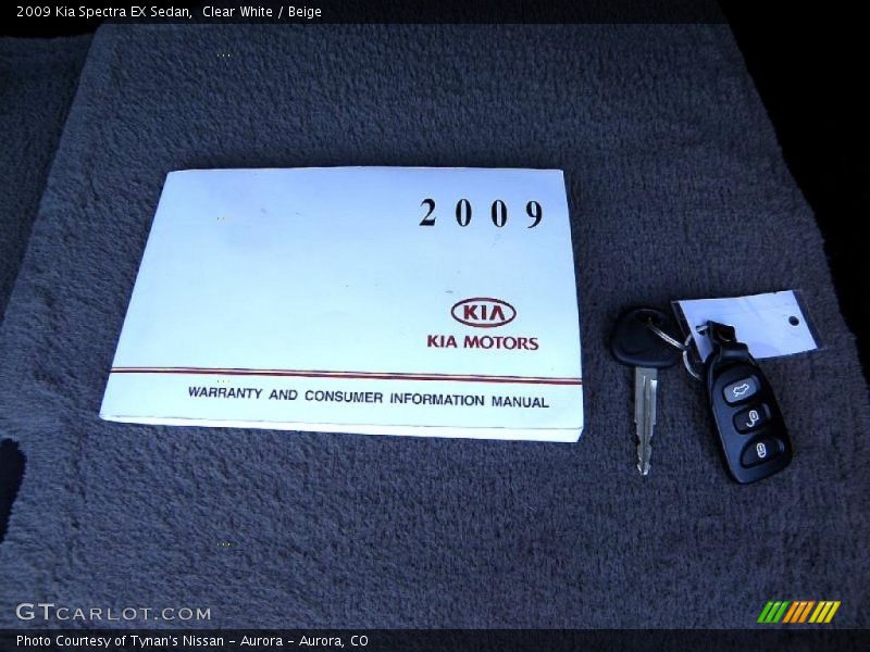 Clear White / Beige 2009 Kia Spectra EX Sedan