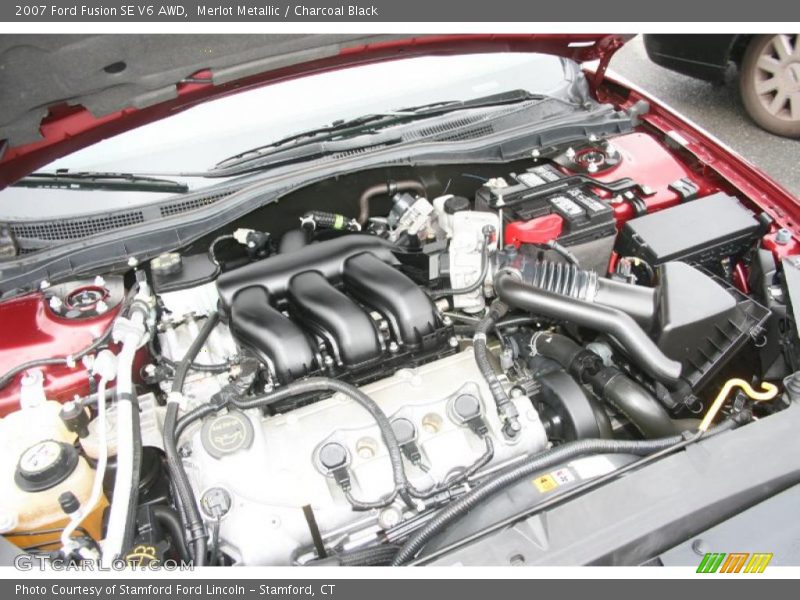 Merlot Metallic / Charcoal Black 2007 Ford Fusion SE V6 AWD