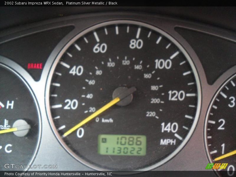 Platinum Silver Metallic / Black 2002 Subaru Impreza WRX Sedan