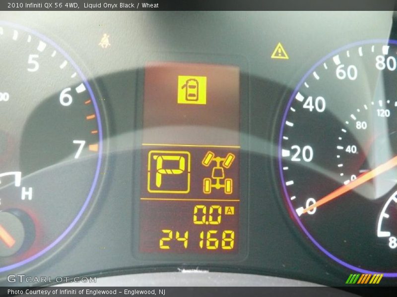 Liquid Onyx Black / Wheat 2010 Infiniti QX 56 4WD