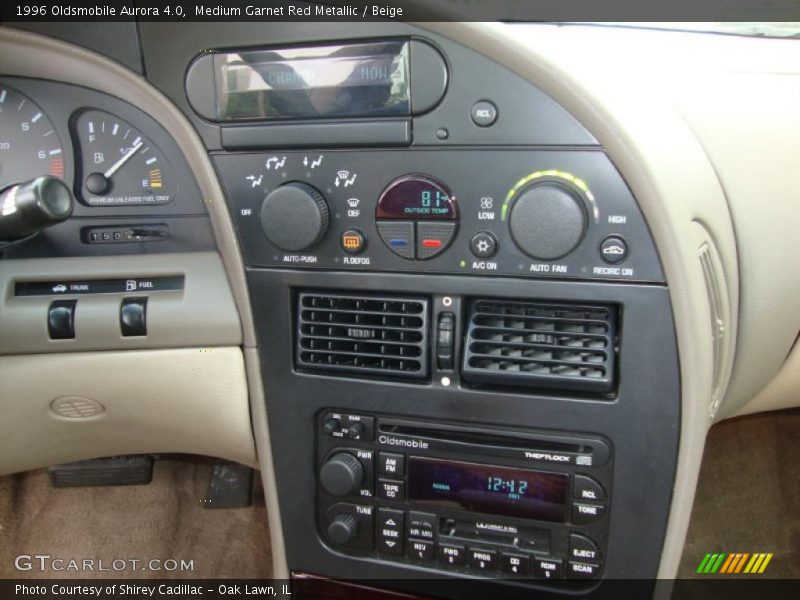Medium Garnet Red Metallic / Beige 1996 Oldsmobile Aurora 4.0
