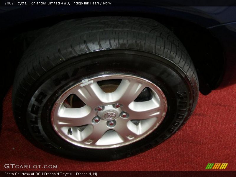 Indigo Ink Pearl / Ivory 2002 Toyota Highlander Limited 4WD