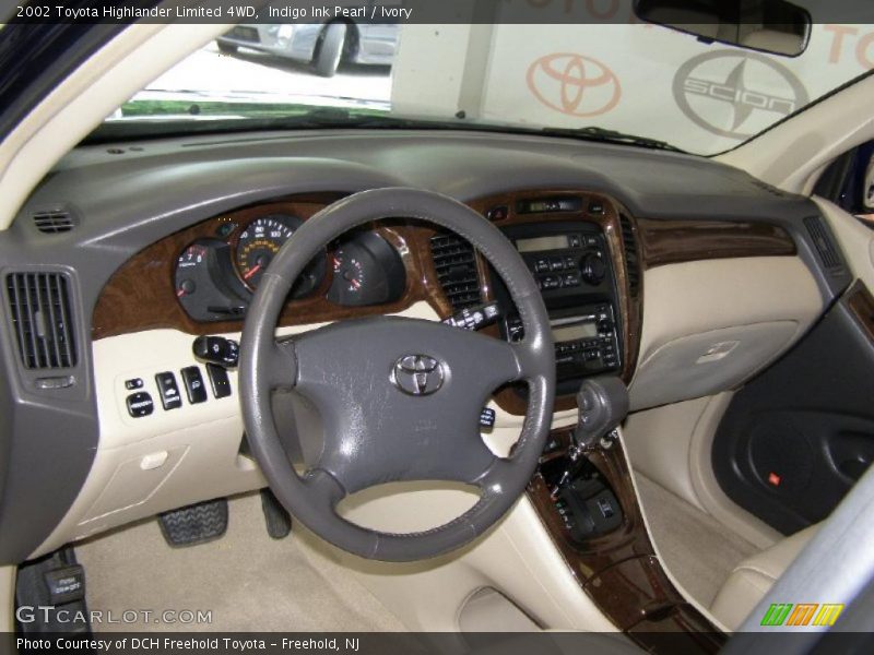 Indigo Ink Pearl / Ivory 2002 Toyota Highlander Limited 4WD