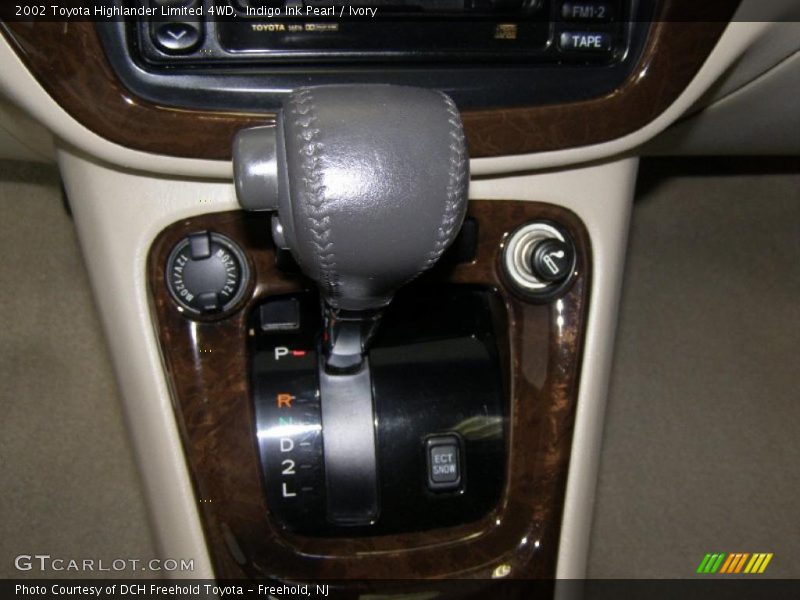 Indigo Ink Pearl / Ivory 2002 Toyota Highlander Limited 4WD