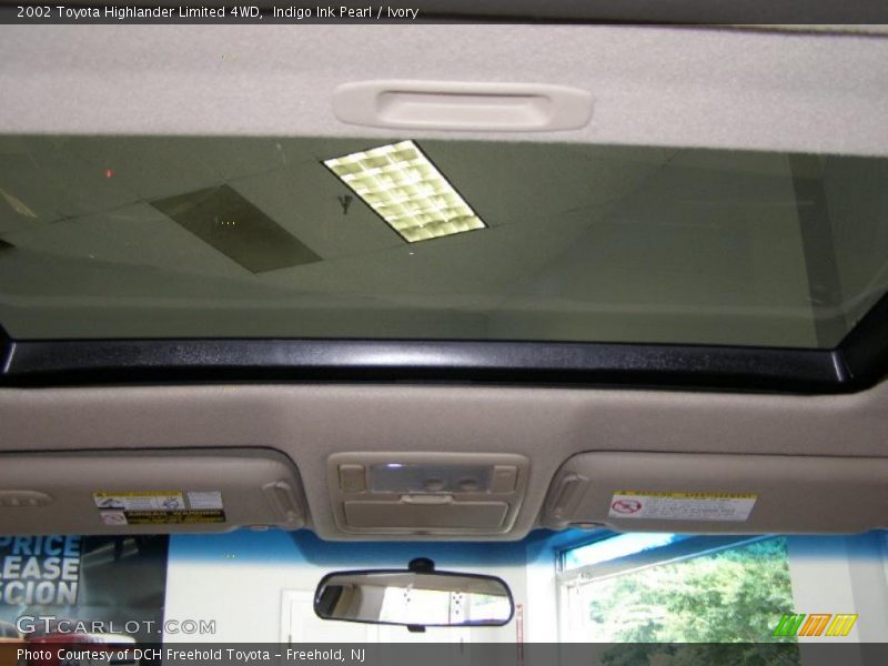 Indigo Ink Pearl / Ivory 2002 Toyota Highlander Limited 4WD