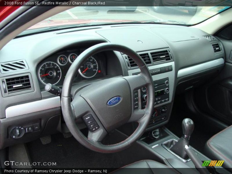 Redfire Metallic / Charcoal Black/Red 2008 Ford Fusion SE