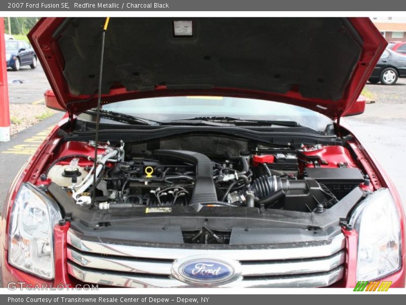 Redfire Metallic / Charcoal Black 2007 Ford Fusion SE