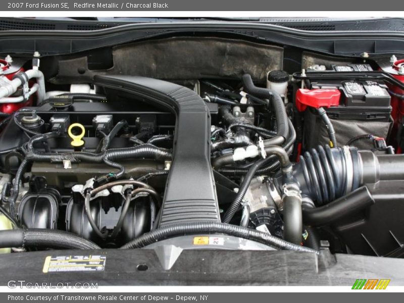 Redfire Metallic / Charcoal Black 2007 Ford Fusion SE