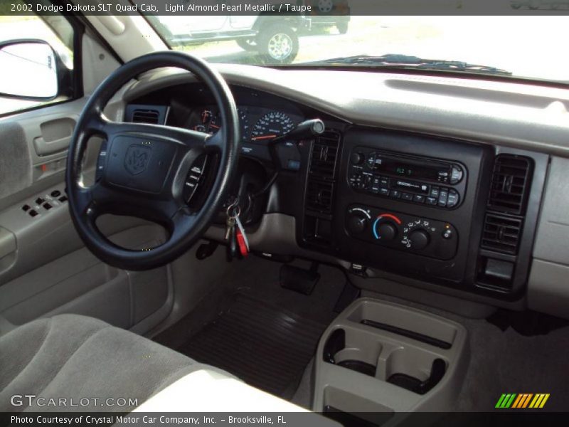 Light Almond Pearl Metallic / Taupe 2002 Dodge Dakota SLT Quad Cab