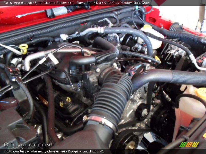 Flame Red / Dark Slate Gray/Medium Slate Gray 2010 Jeep Wrangler Sport Islander Edition 4x4
