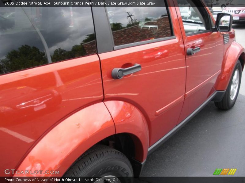 Sunburst Orange Pearl / Dark Slate Gray/Light Slate Gray 2009 Dodge Nitro SE 4x4