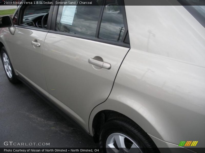Sonoran Sand / Charcoal 2009 Nissan Versa 1.8 SL Sedan