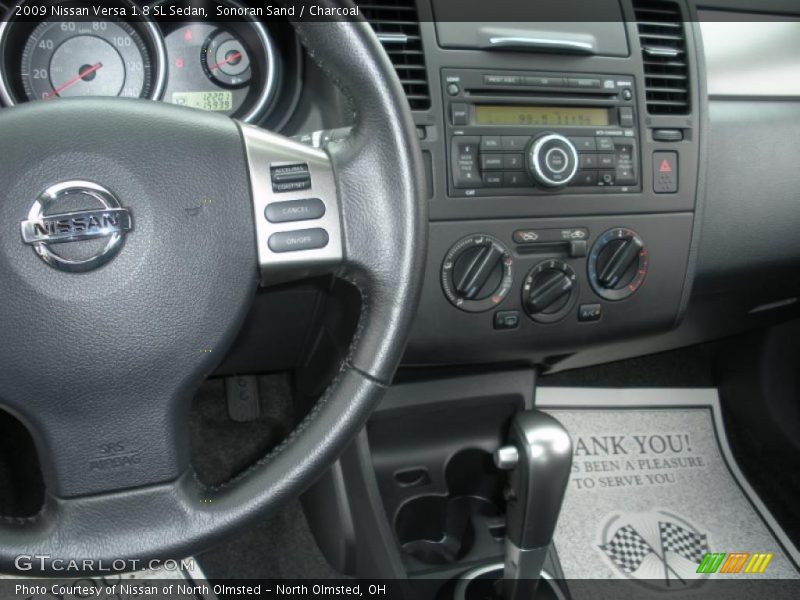Sonoran Sand / Charcoal 2009 Nissan Versa 1.8 SL Sedan