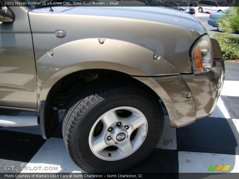 Gold Rush Metallic / Beige 2001 Nissan Frontier SE V6 Crew Cab