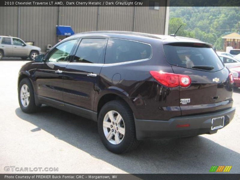 Dark Cherry Metallic / Dark Gray/Light Gray 2010 Chevrolet Traverse LT AWD