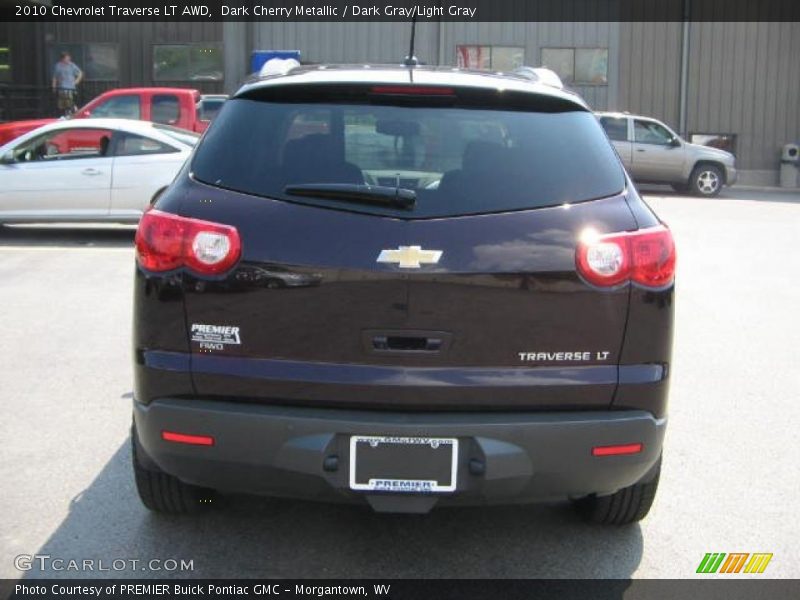 Dark Cherry Metallic / Dark Gray/Light Gray 2010 Chevrolet Traverse LT AWD