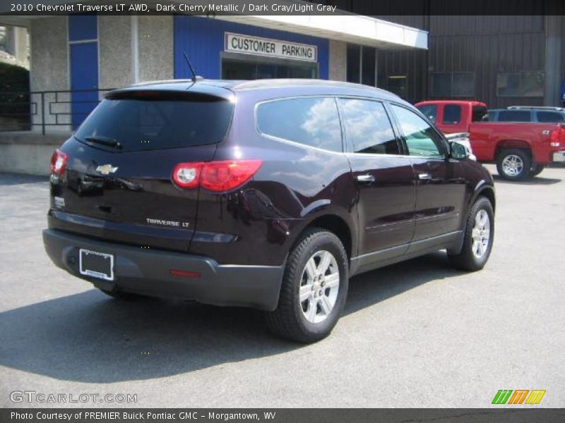 Dark Cherry Metallic / Dark Gray/Light Gray 2010 Chevrolet Traverse LT AWD