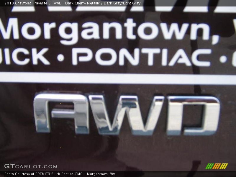 Dark Cherry Metallic / Dark Gray/Light Gray 2010 Chevrolet Traverse LT AWD