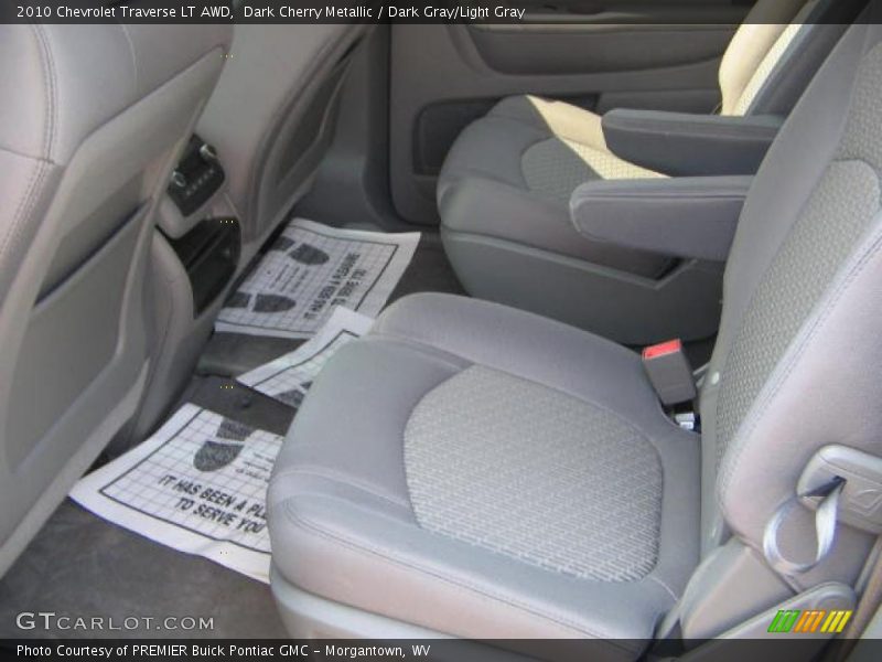 Dark Cherry Metallic / Dark Gray/Light Gray 2010 Chevrolet Traverse LT AWD