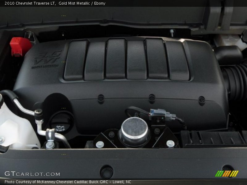 Gold Mist Metallic / Ebony 2010 Chevrolet Traverse LT