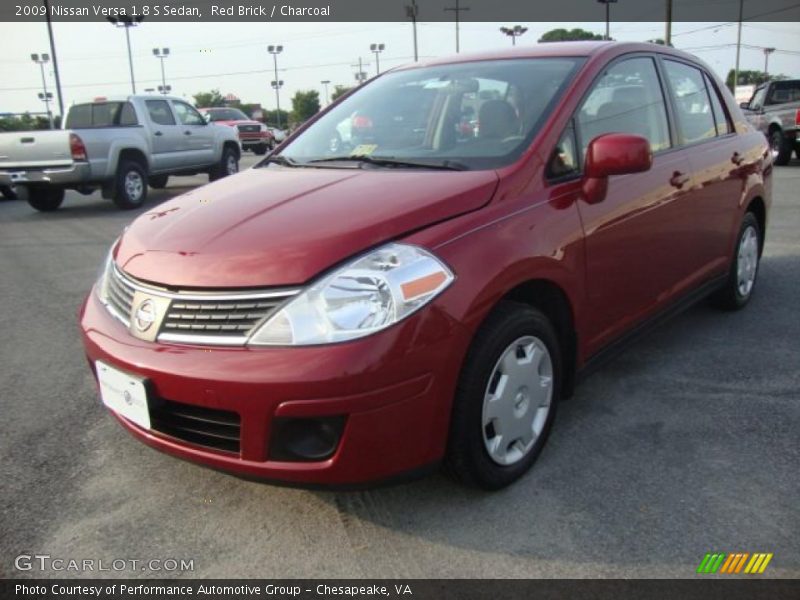 Red Brick / Charcoal 2009 Nissan Versa 1.8 S Sedan