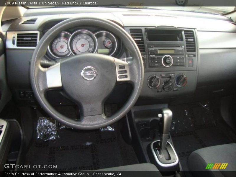 Red Brick / Charcoal 2009 Nissan Versa 1.8 S Sedan