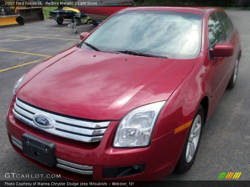Redfire Metallic / Light Stone 2007 Ford Fusion SE