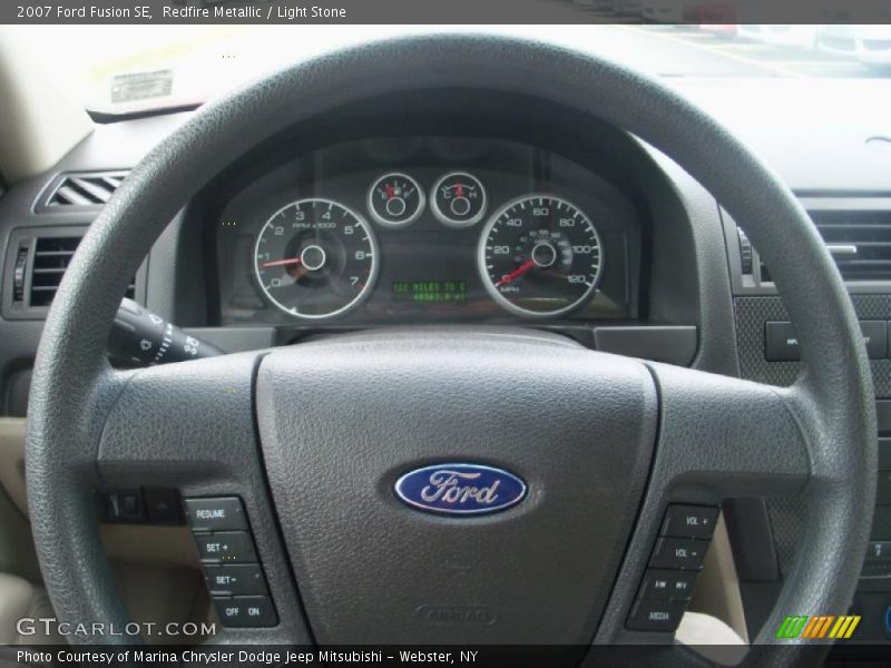 Redfire Metallic / Light Stone 2007 Ford Fusion SE