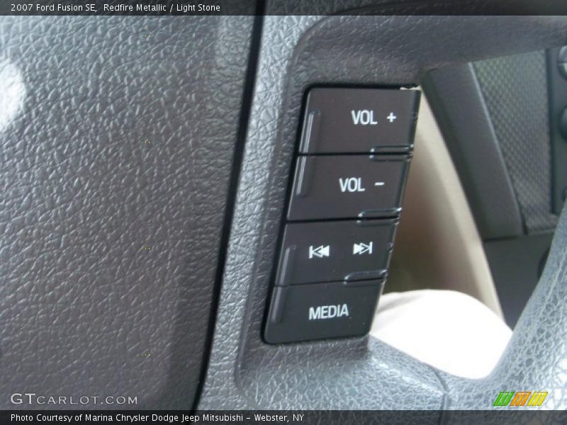 Redfire Metallic / Light Stone 2007 Ford Fusion SE