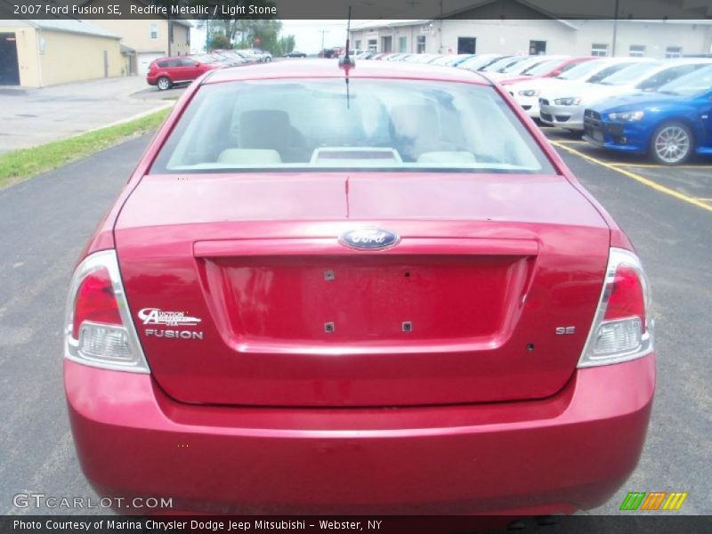 Redfire Metallic / Light Stone 2007 Ford Fusion SE