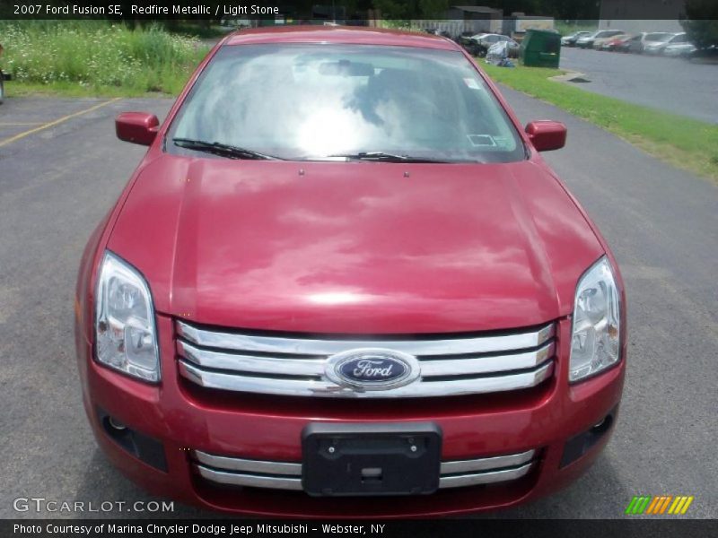 Redfire Metallic / Light Stone 2007 Ford Fusion SE