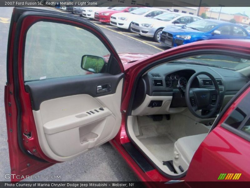 Redfire Metallic / Light Stone 2007 Ford Fusion SE
