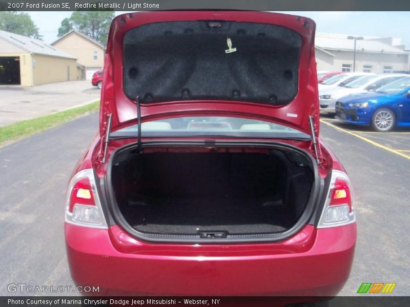 Redfire Metallic / Light Stone 2007 Ford Fusion SE