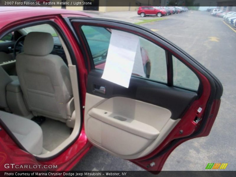 Redfire Metallic / Light Stone 2007 Ford Fusion SE