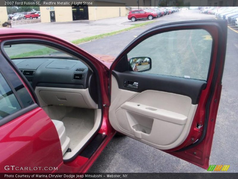Redfire Metallic / Light Stone 2007 Ford Fusion SE