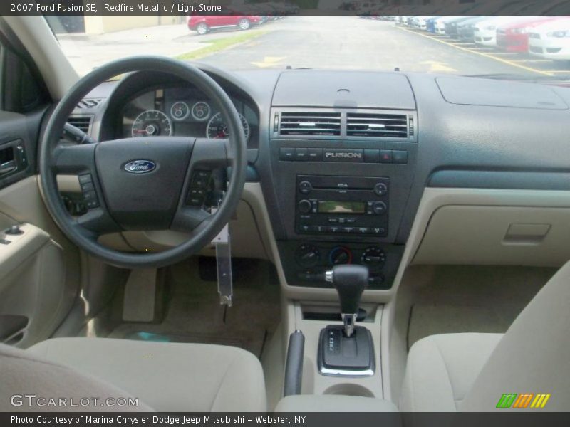 Redfire Metallic / Light Stone 2007 Ford Fusion SE