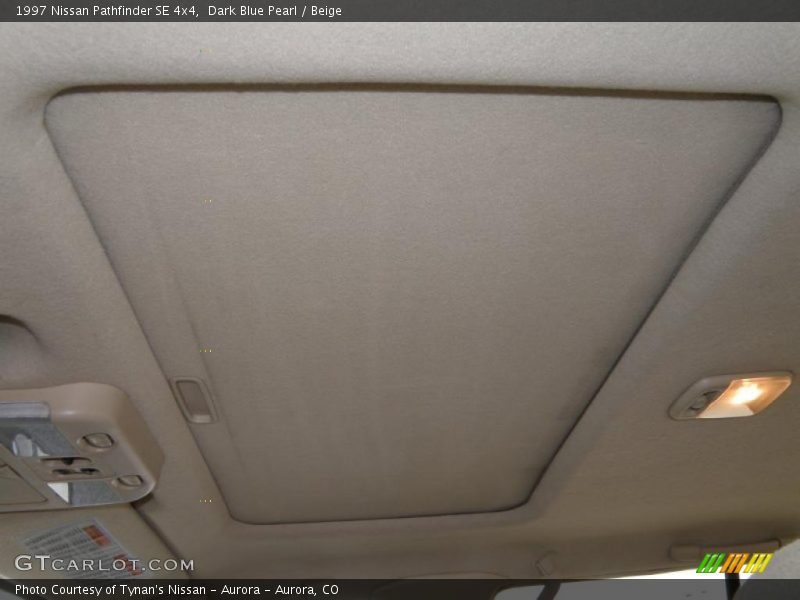 Dark Blue Pearl / Beige 1997 Nissan Pathfinder SE 4x4