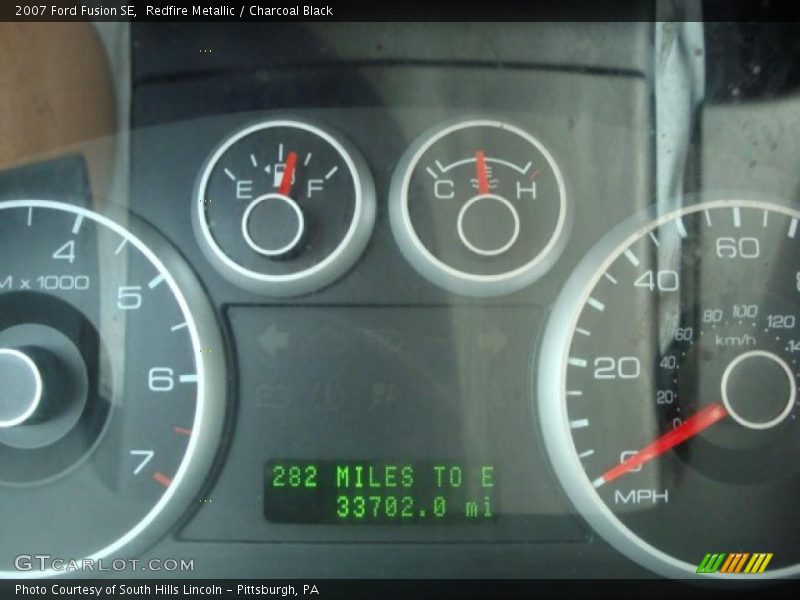 Redfire Metallic / Charcoal Black 2007 Ford Fusion SE
