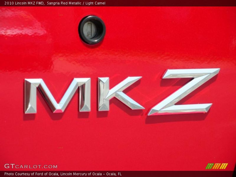 Sangria Red Metallic / Light Camel 2010 Lincoln MKZ FWD