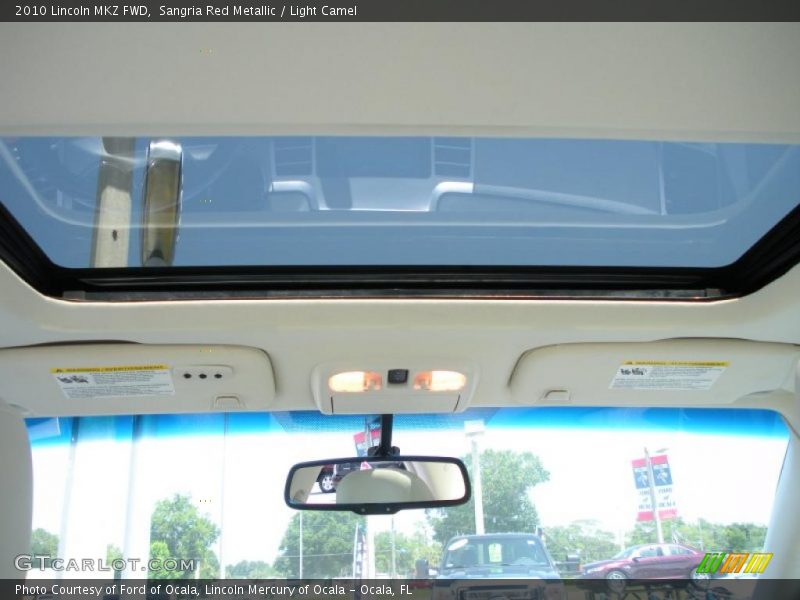 Sangria Red Metallic / Light Camel 2010 Lincoln MKZ FWD