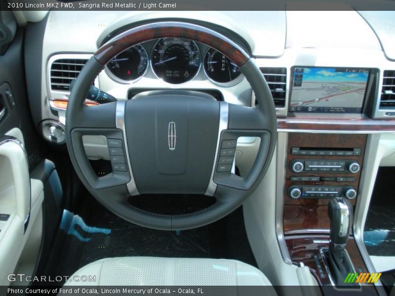 Sangria Red Metallic / Light Camel 2010 Lincoln MKZ FWD