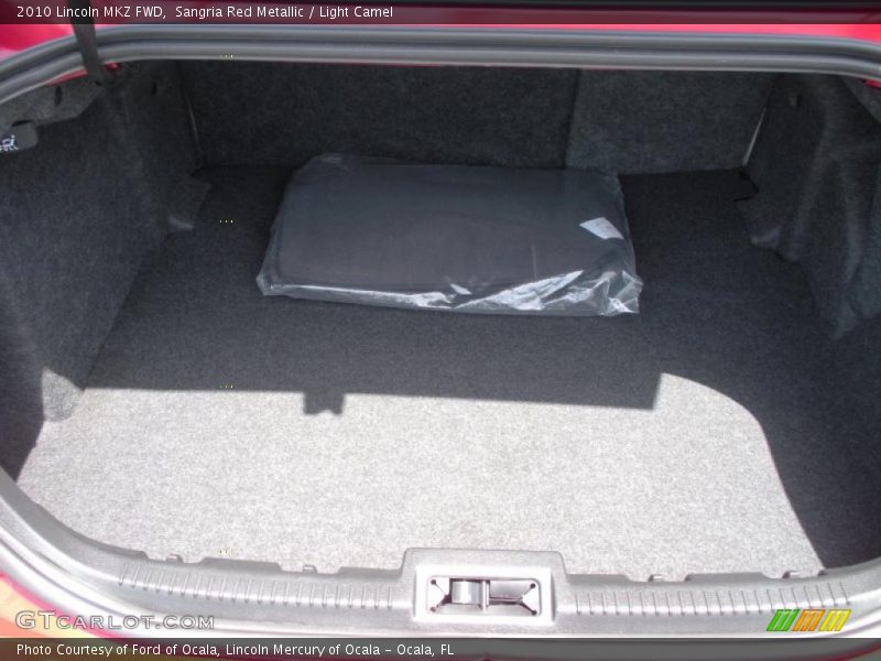 Sangria Red Metallic / Light Camel 2010 Lincoln MKZ FWD
