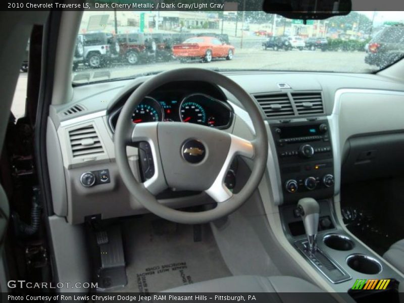 Dark Cherry Metallic / Dark Gray/Light Gray 2010 Chevrolet Traverse LS