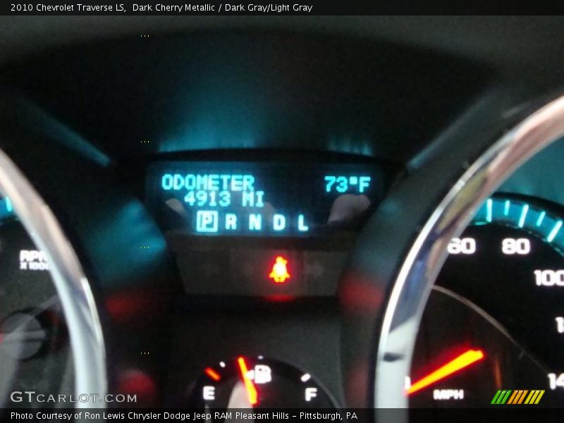 Dark Cherry Metallic / Dark Gray/Light Gray 2010 Chevrolet Traverse LS