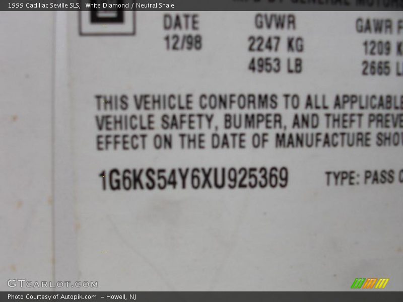 White Diamond / Neutral Shale 1999 Cadillac Seville SLS
