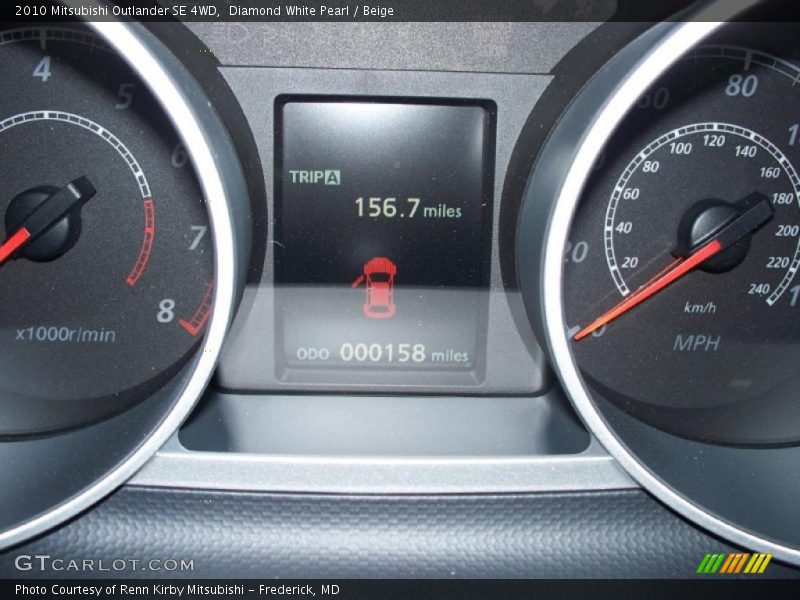 Diamond White Pearl / Beige 2010 Mitsubishi Outlander SE 4WD
