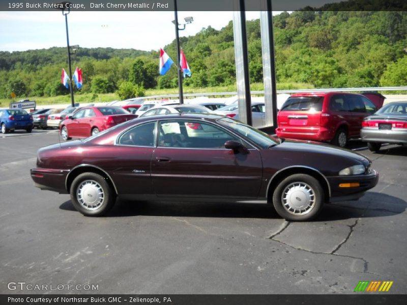 Dark Cherry Metallic / Red 1995 Buick Riviera Coupe