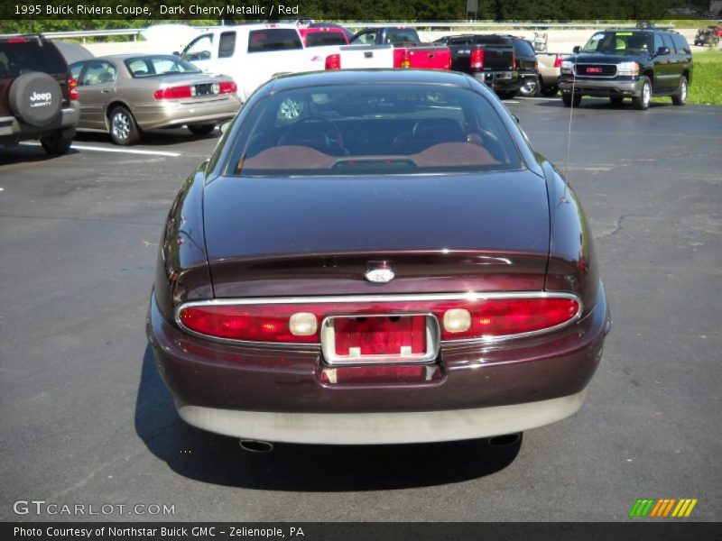 Dark Cherry Metallic / Red 1995 Buick Riviera Coupe