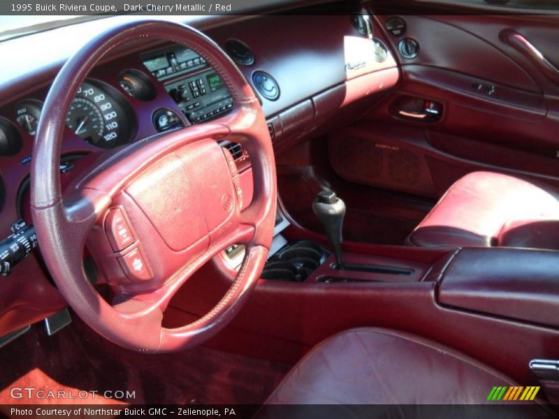 Dark Cherry Metallic / Red 1995 Buick Riviera Coupe