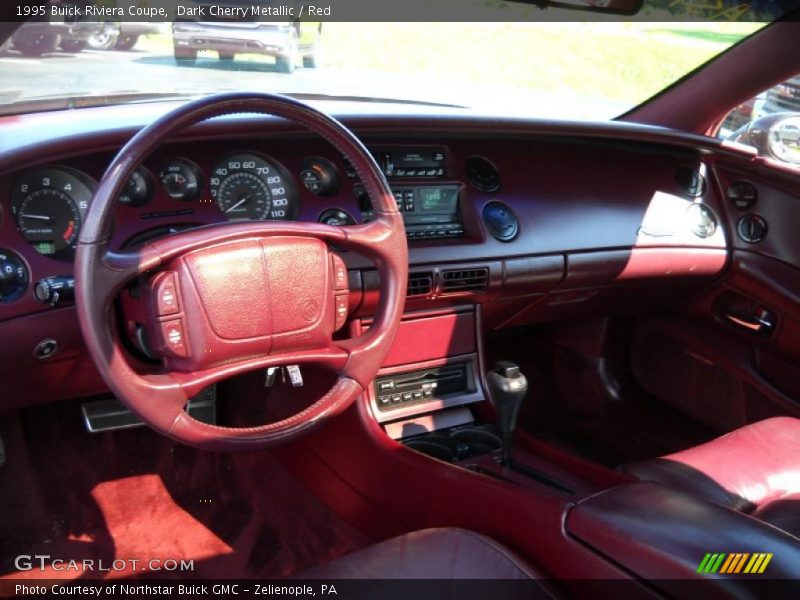 Dark Cherry Metallic / Red 1995 Buick Riviera Coupe